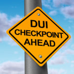 D.U.I and sobriety checkpoint ahead road sign