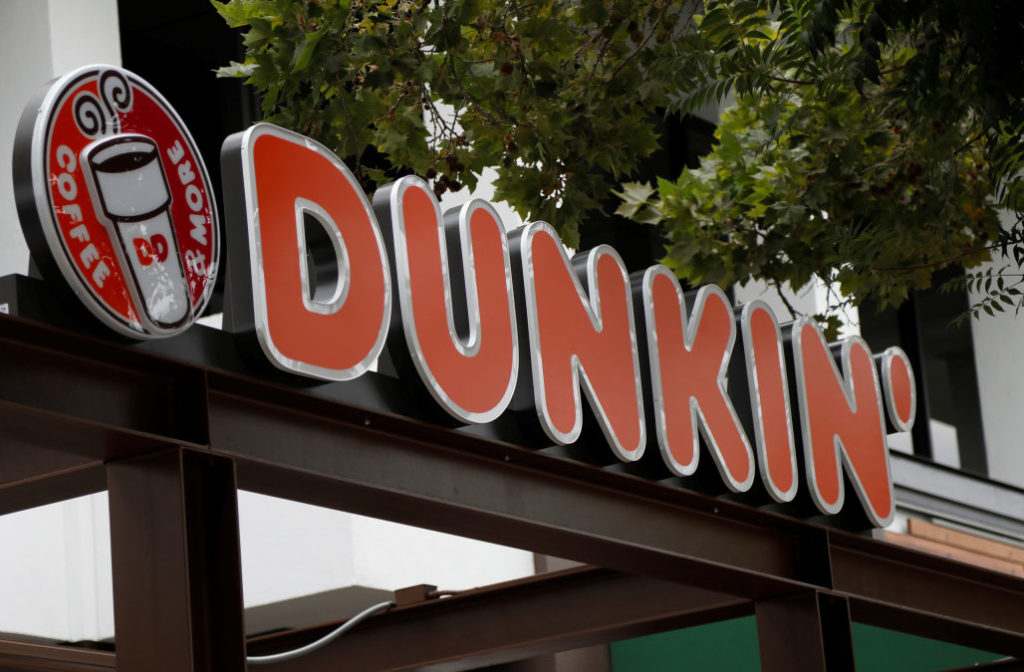 The sign of a Dunkin' store, the first since a rebranding by the Dunkin' Donuts chain, is pictured ahead of its opening in Pasadena